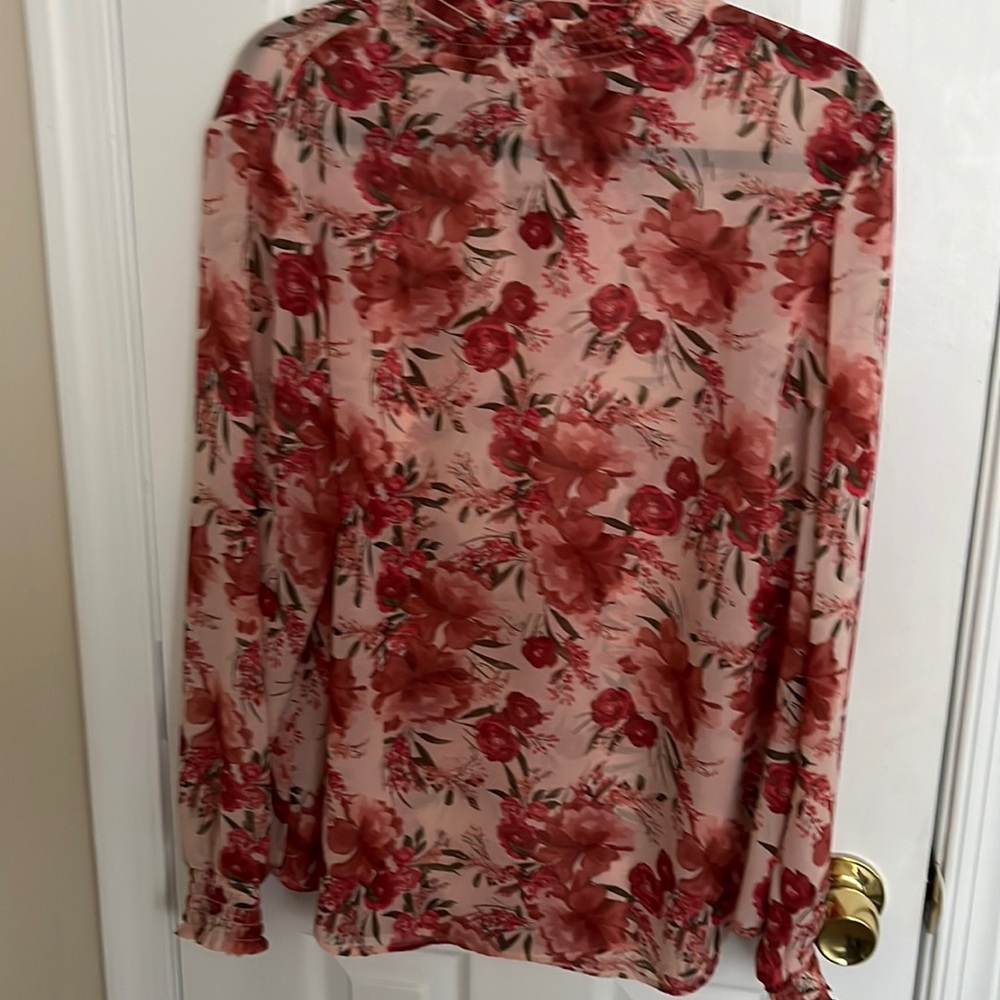 Torrid floral blouse size 0 large 12 never worn just no tags attached